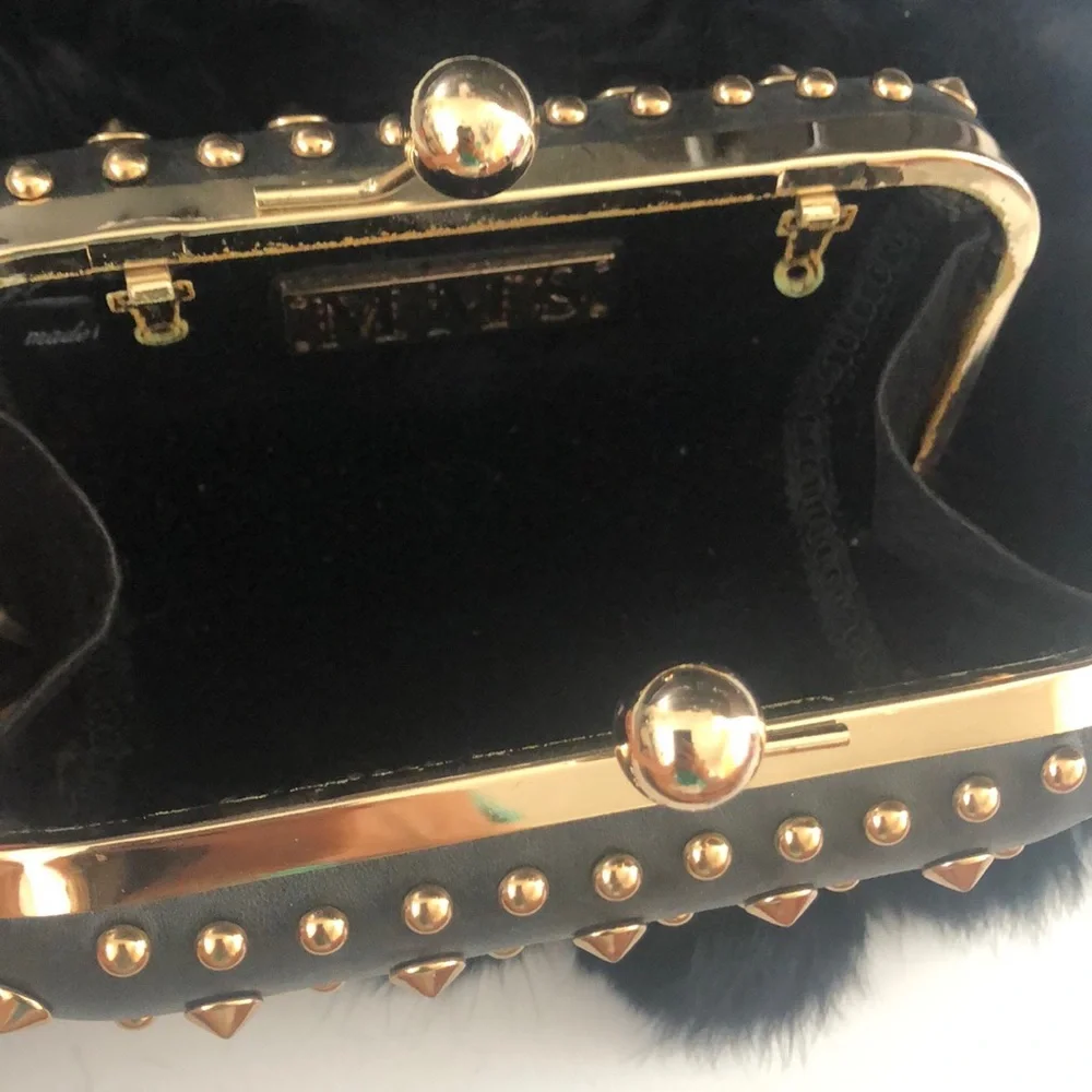 Black studded clutch